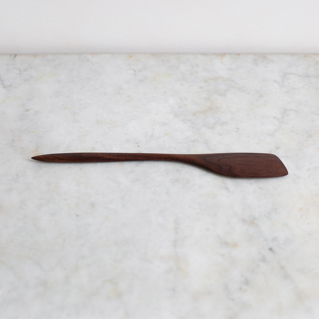 http://www.elleihome.com/cdn/shop/products/INGREDIENTS_LDN_hand_carved_wooden_black_walnut_cooking_spatula-2_1200x1200.jpg?v=1628692104