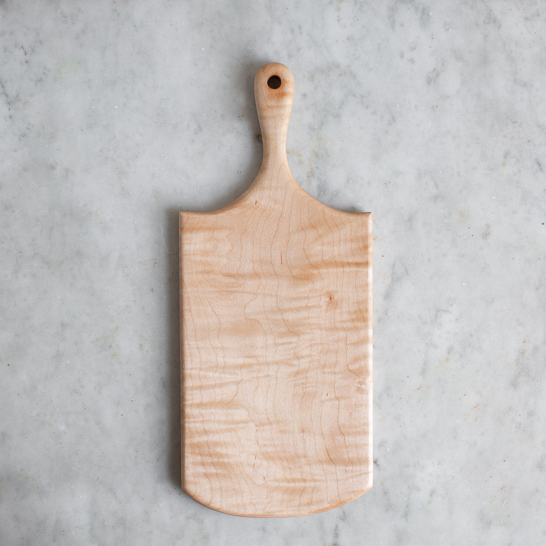 http://www.elleihome.com/cdn/shop/products/INGREDIENTS_LDN_hand_carved_wooden_curly_maple_cutting_serving_board-2_1200x1200.jpg?v=1586187546