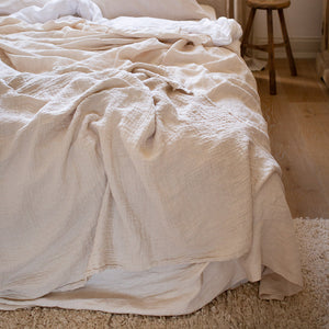 HANDMADE CRUSHED LINEN BLANKET IN WARM WHITE