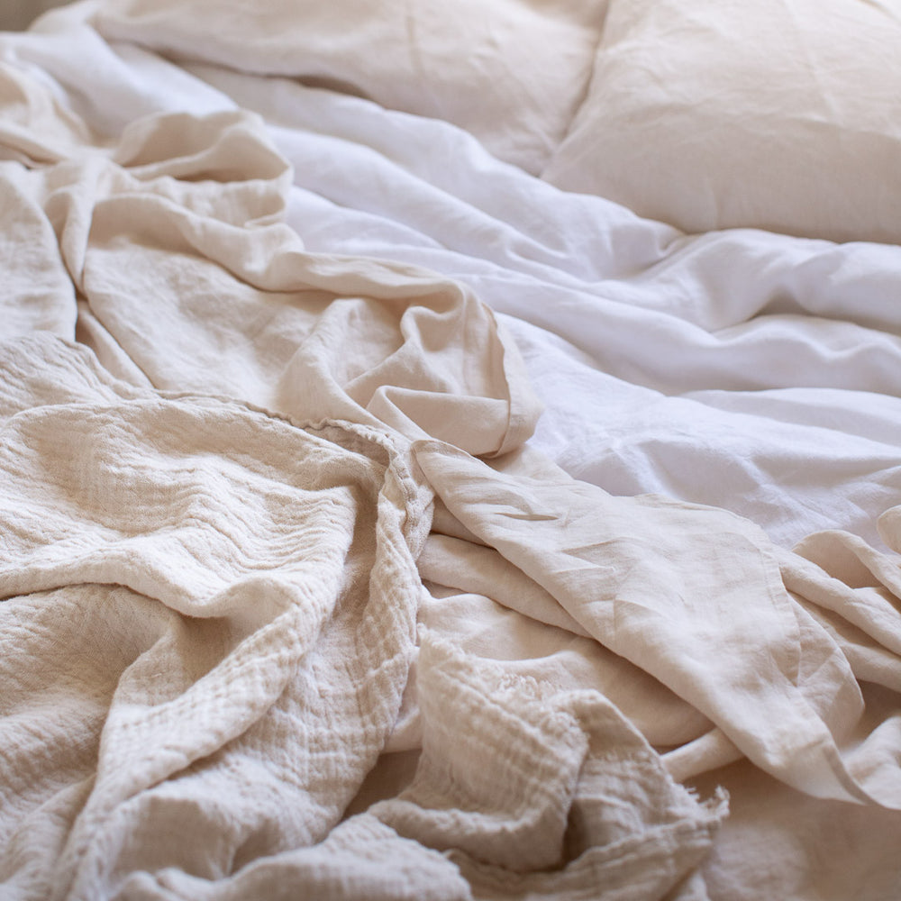 HANDMADE CRUSHED LINEN BLANKET IN WARM WHITE