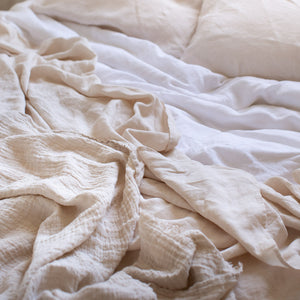 HANDMADE CRUSHED LINEN BLANKET IN WARM WHITE