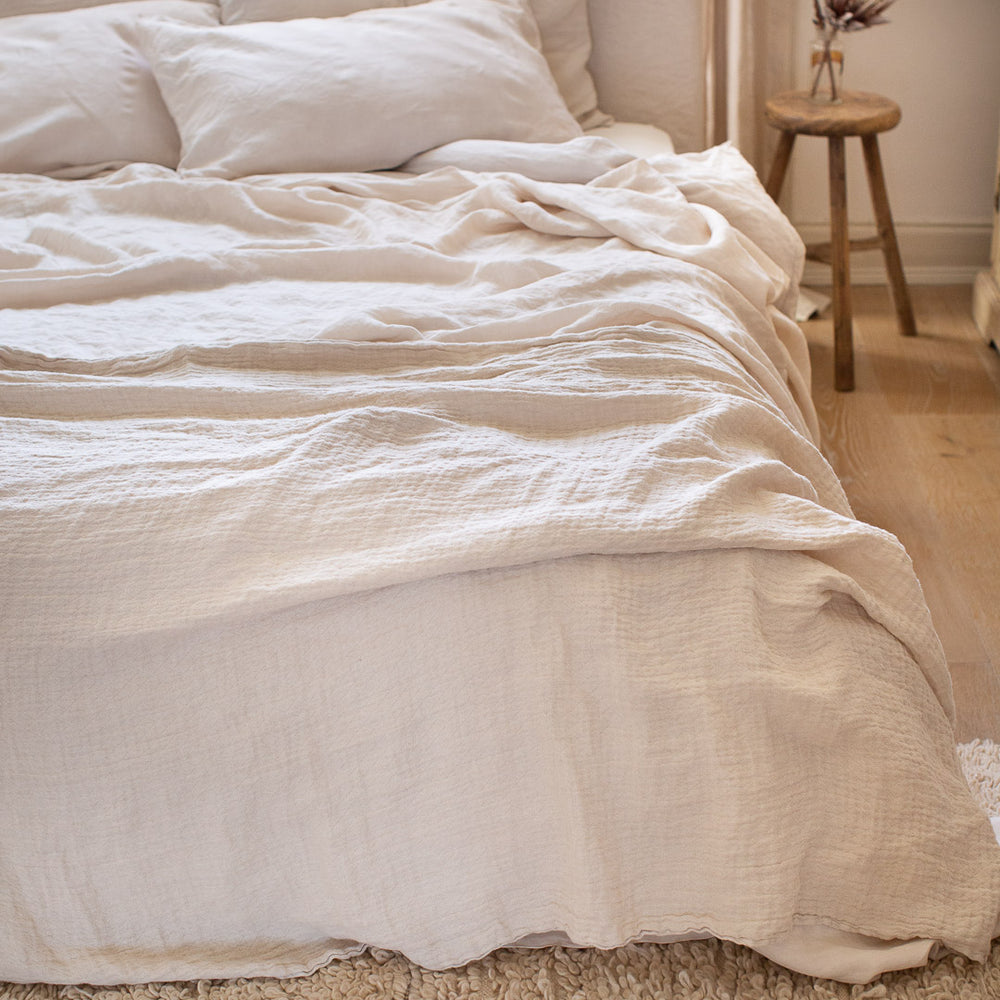 HANDMADE CRUSHED LINEN BLANKET IN WARM WHITE