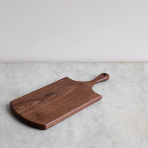 HAND CARVED BLACK WALNUT CUTTING BOARD