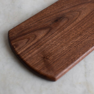 HAND CARVED BLACK WALNUT CUTTING BOARD