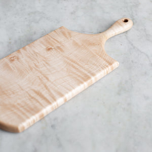HAND CARVED CURLY MAPLE CUTTING BOARD