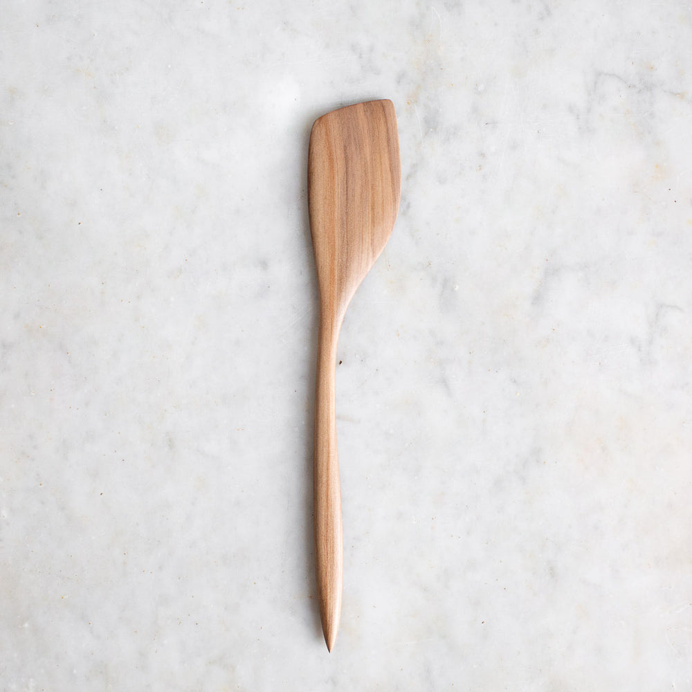 https://www.elleihome.com/cdn/shop/products/INGREDIENTS_LDN_hand_carved_wooden_sweet_gum_cooking_spatula-4_1000x1000.jpg?v=1628694559