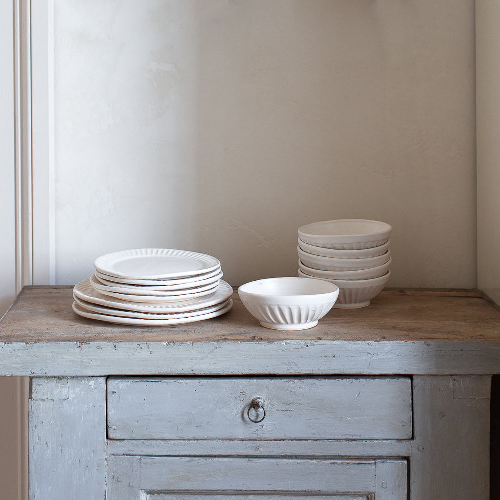 handmade stoneware fluted bowls and plates
